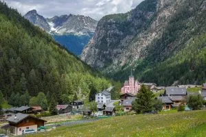 The alpine village of trient with its pink church